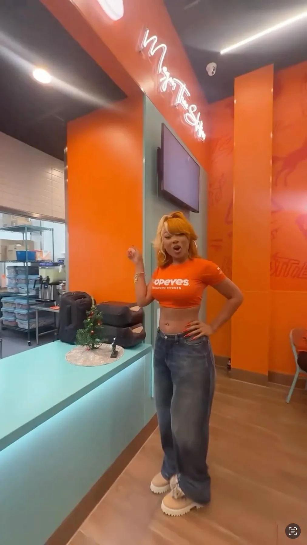 Megan Thee Stallion's wore an '80s-era bodysuit with cutouts for a Dunkin' ad.