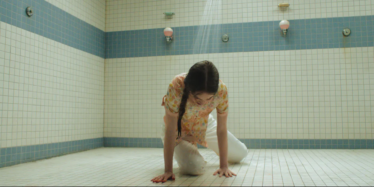 Summer H Howell as Carrie White in the Mike Flanagan Carrie TV Series holding her hands out