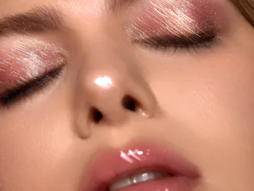 A model wearing SHEGLAM Crystal Jelly Glaze Eyeshadow Stick