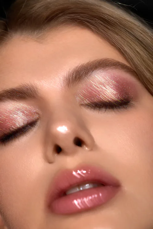A model wearing SHEGLAM Crystal Jelly Glaze Eyeshadow Stick