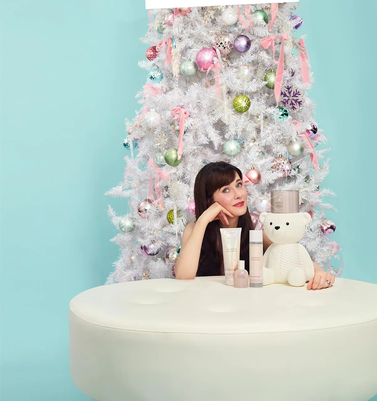 Zooey Deschanel dishes on her favorite holiday movie, scents, and traditions. 