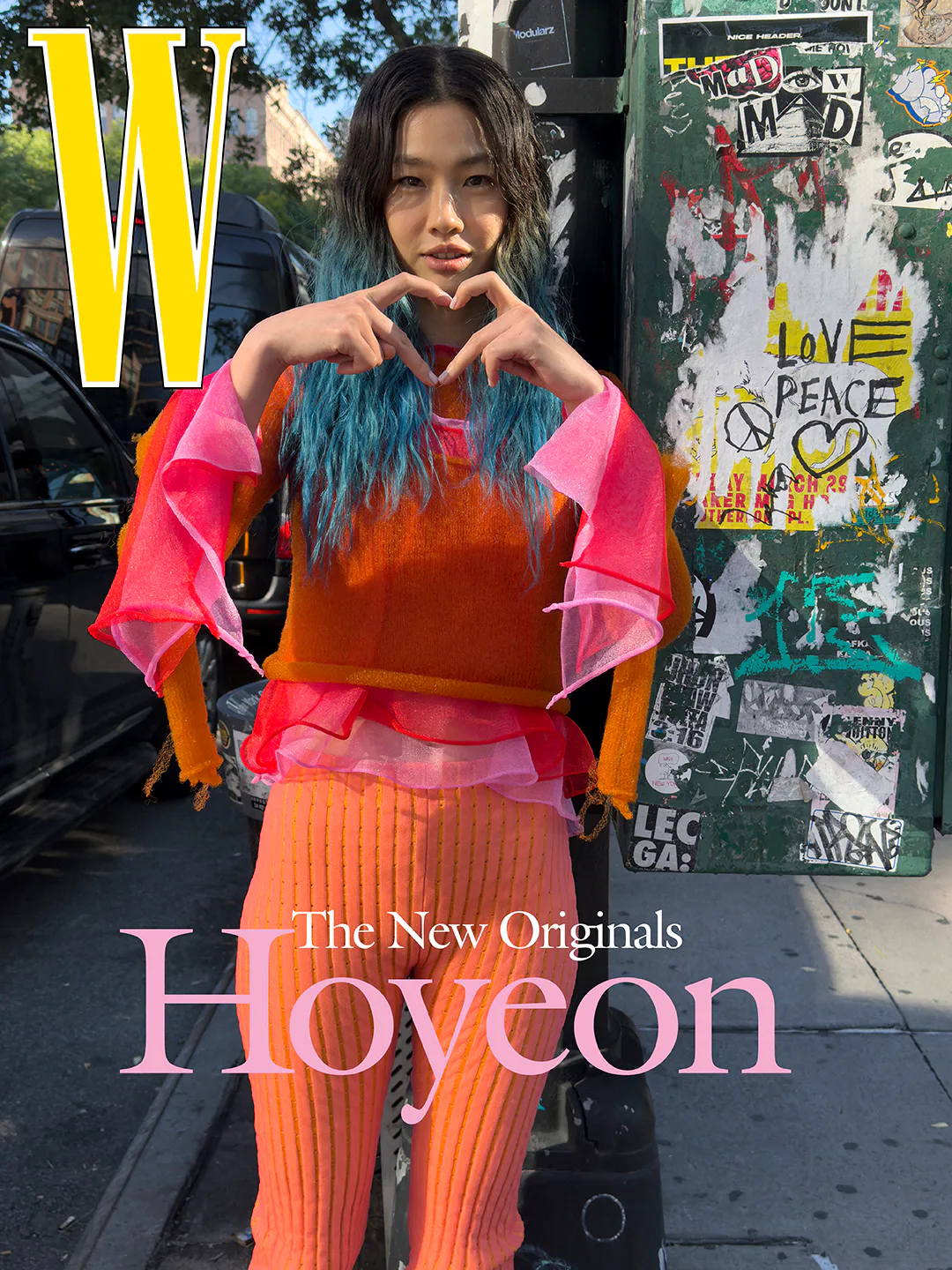 Hoyeon wears orange Louis Vuitton top and pants on W Cover