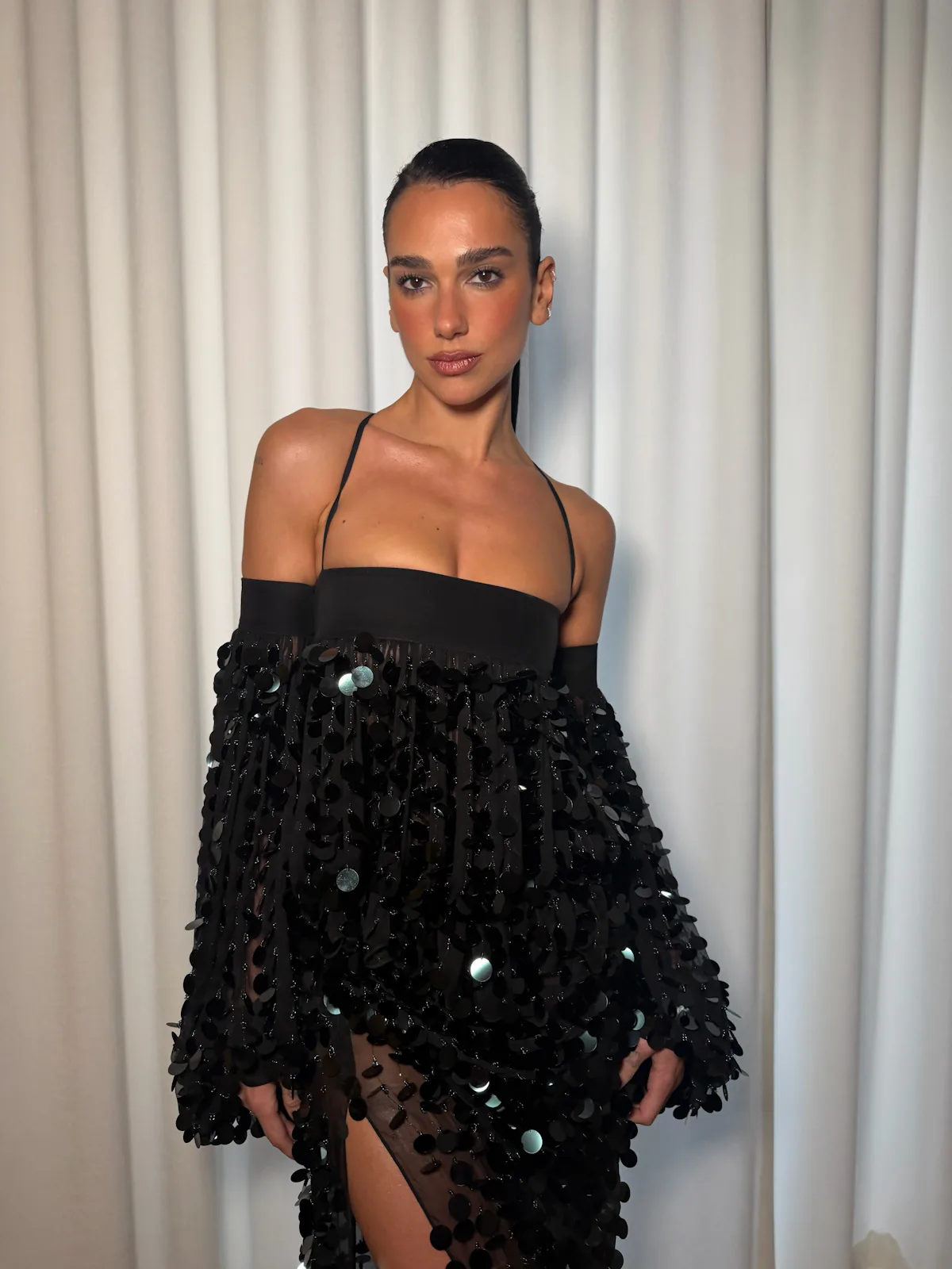 Dua Lipa's Chanel couture refines drama into quiet presence at WSJ awards