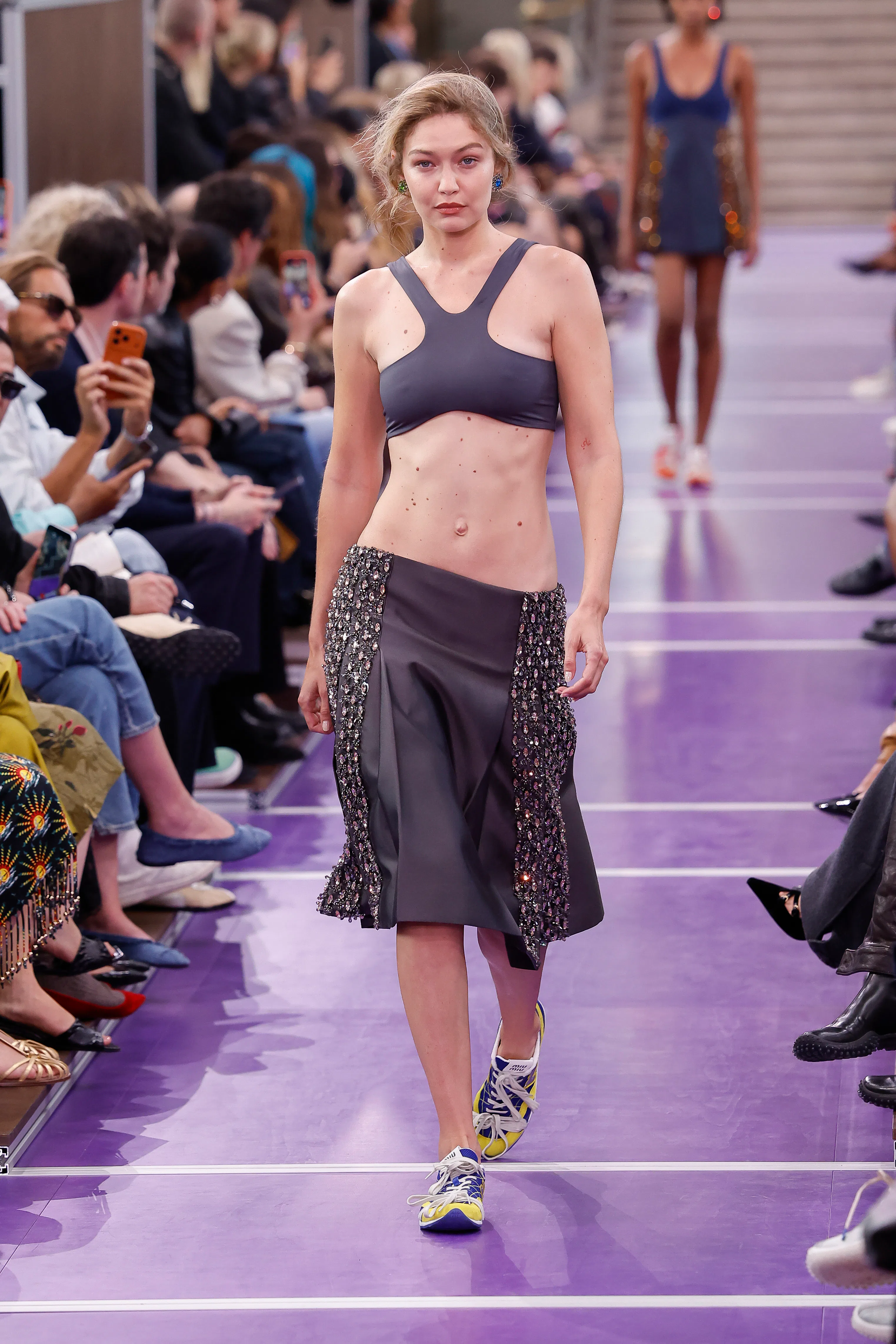 Gigi Hadid walks the runway during the Miu Miu Womenswear Spring/Summer 2027 show as part of Paris F...