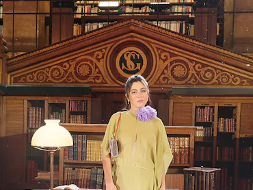 Mika Abdalla at Paris Fashion Week wearing Valentino.