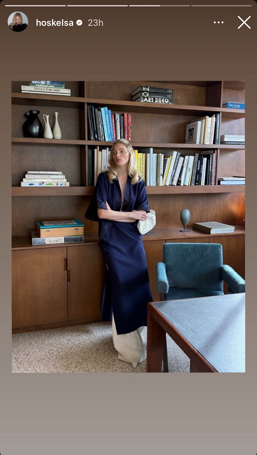 Elsa Hosk wears a black tunic.