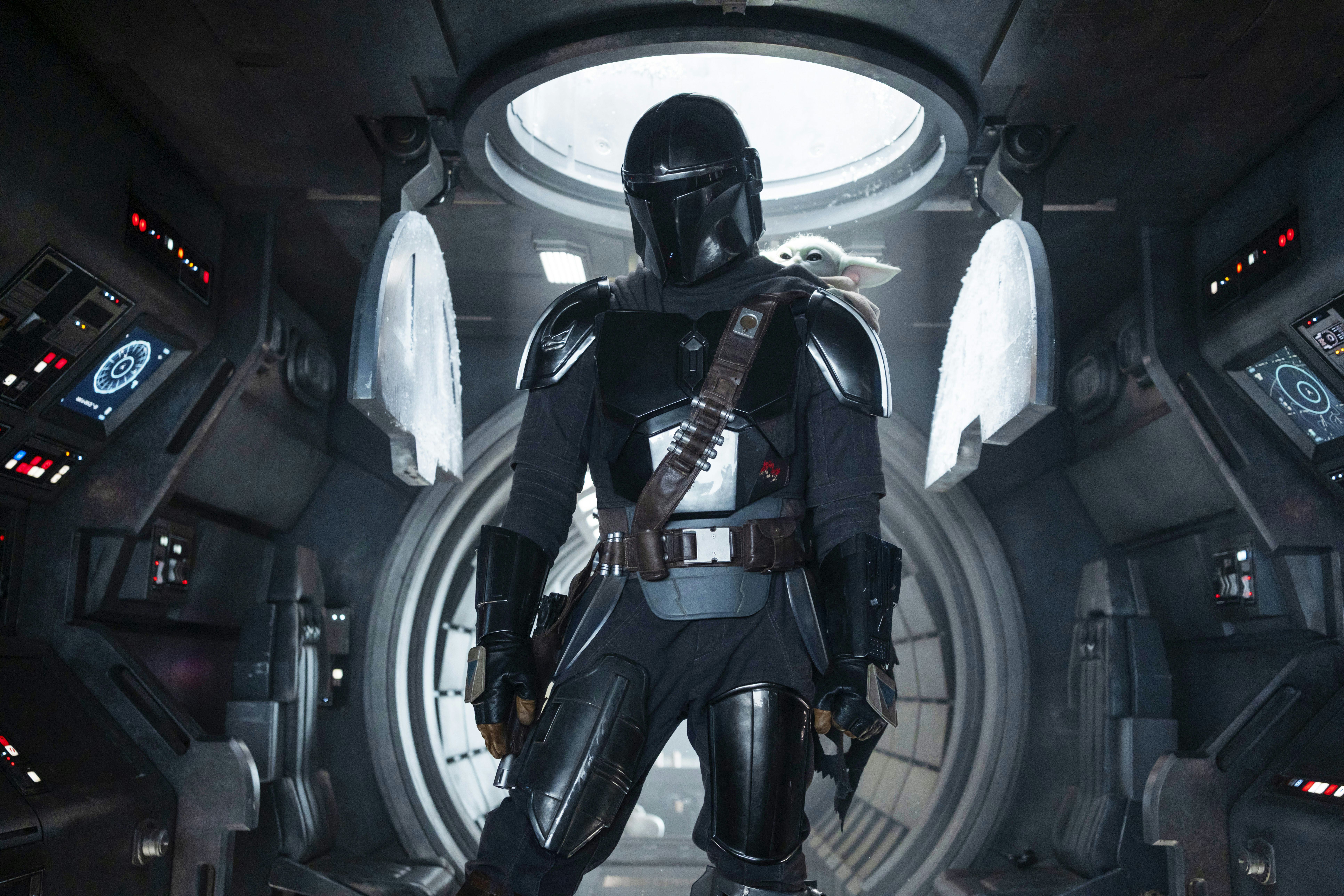 Din Djarin (Pedro Pascal) and Grogu in The Mandalorian and Grogu