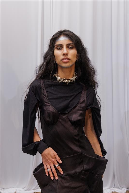 Teased hair at Collina Strada.