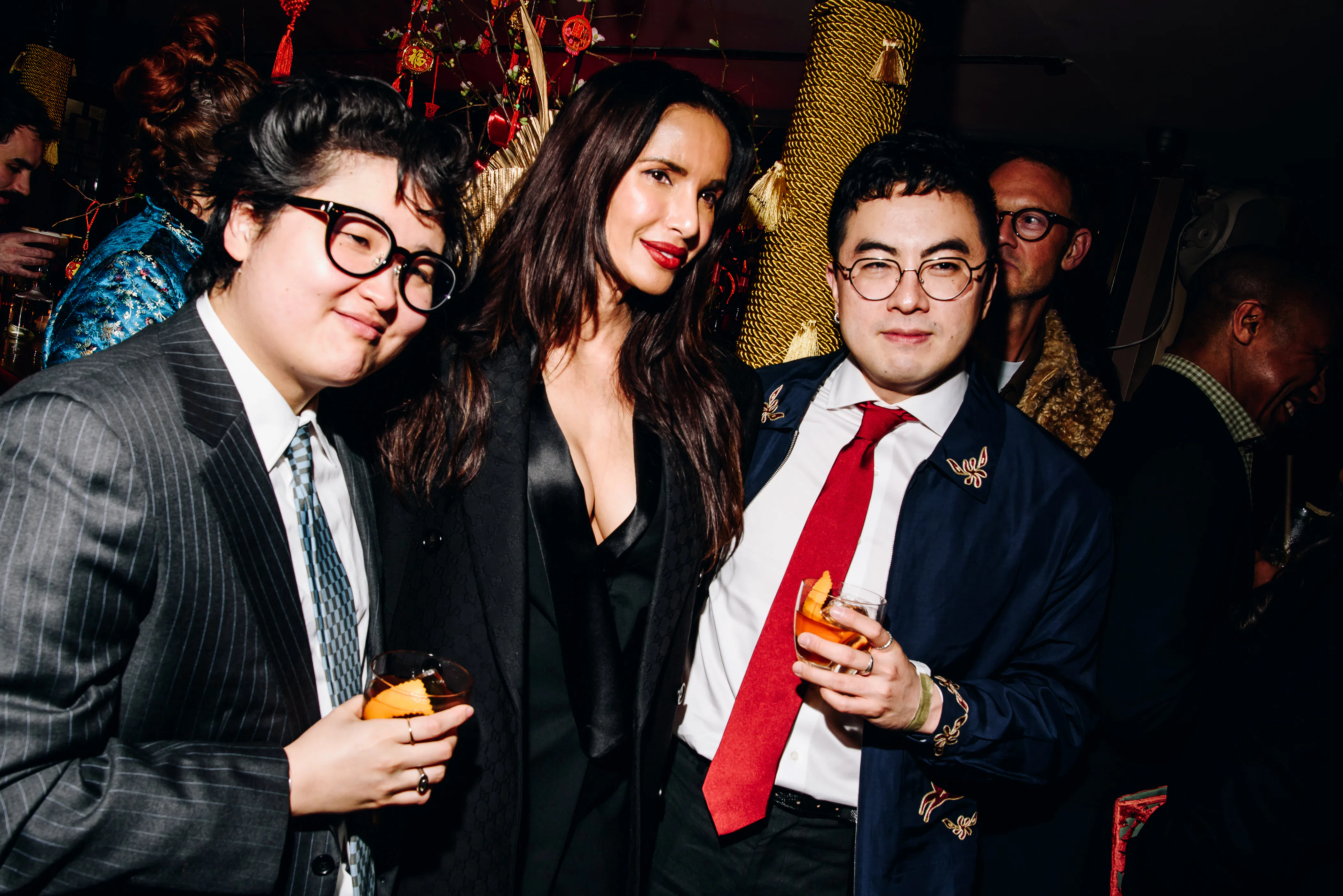 Celeste Yim, Padma Lakshmi and Bowen Yang at the Gold House Lunar New Year event during RTW Fall 202...