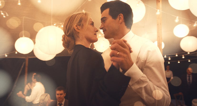 Sarah Pidgeon as Carolyn Bessette and Paul Kelly as John F. Kennedy Jr.