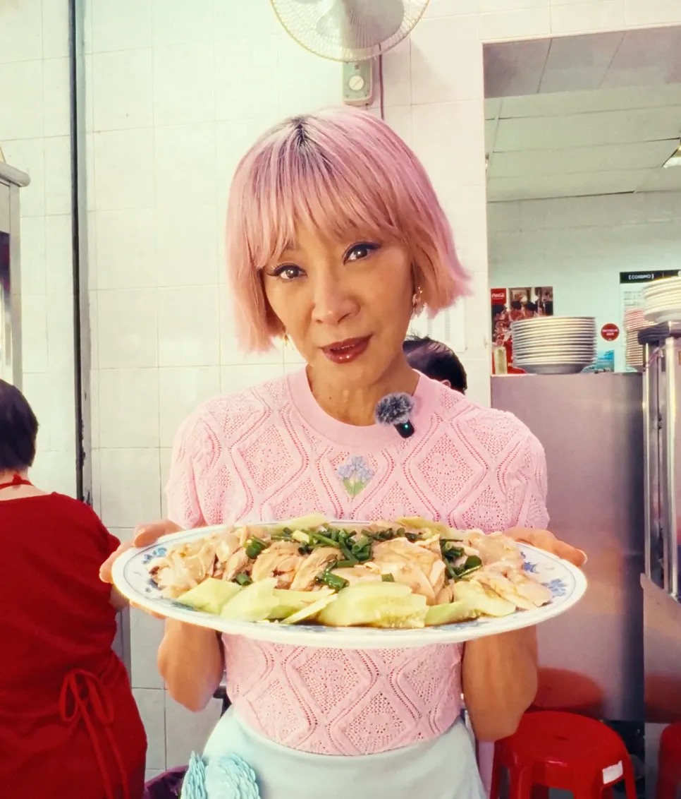 Michelle Yeoh in a pink wig for Sandiwara