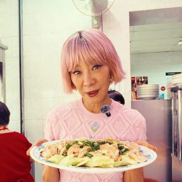 Michelle Yeoh in a pink wig for Sandiwara