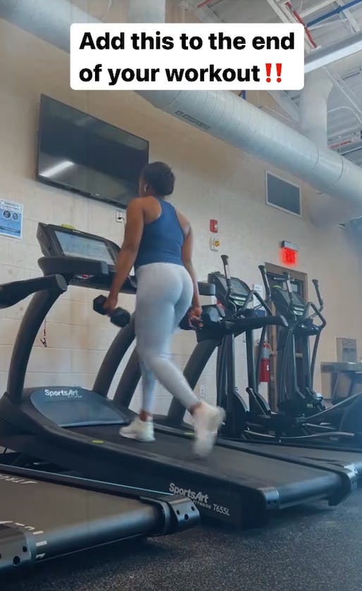 Treadmill with dumbbells.