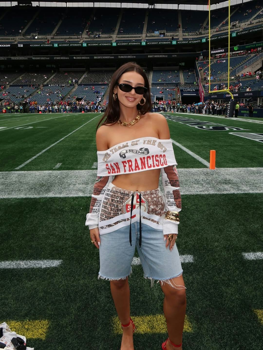Kristin Juszczyk wearing upcycled jeans.
