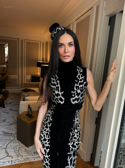 Demi Moore standing in a doorway in a pic