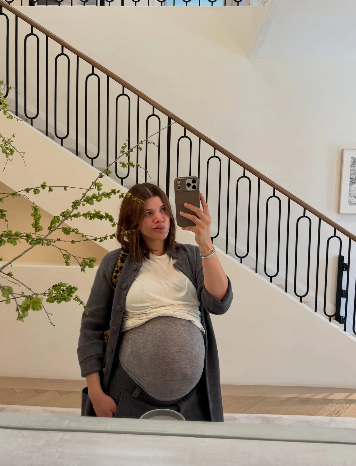 Sofia Richie Grainge in a mirror selfie with caramelized brunette hair 