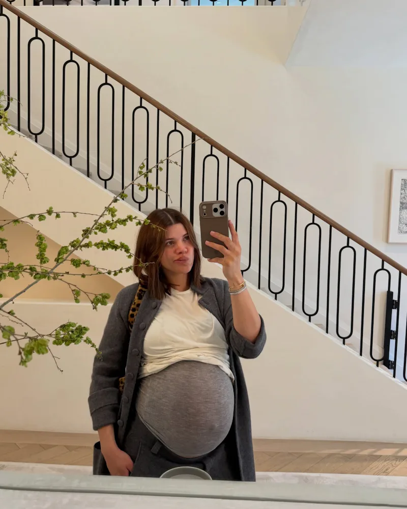 Sofia Richie Grainge in a mirror selfie with caramelized brunette hair