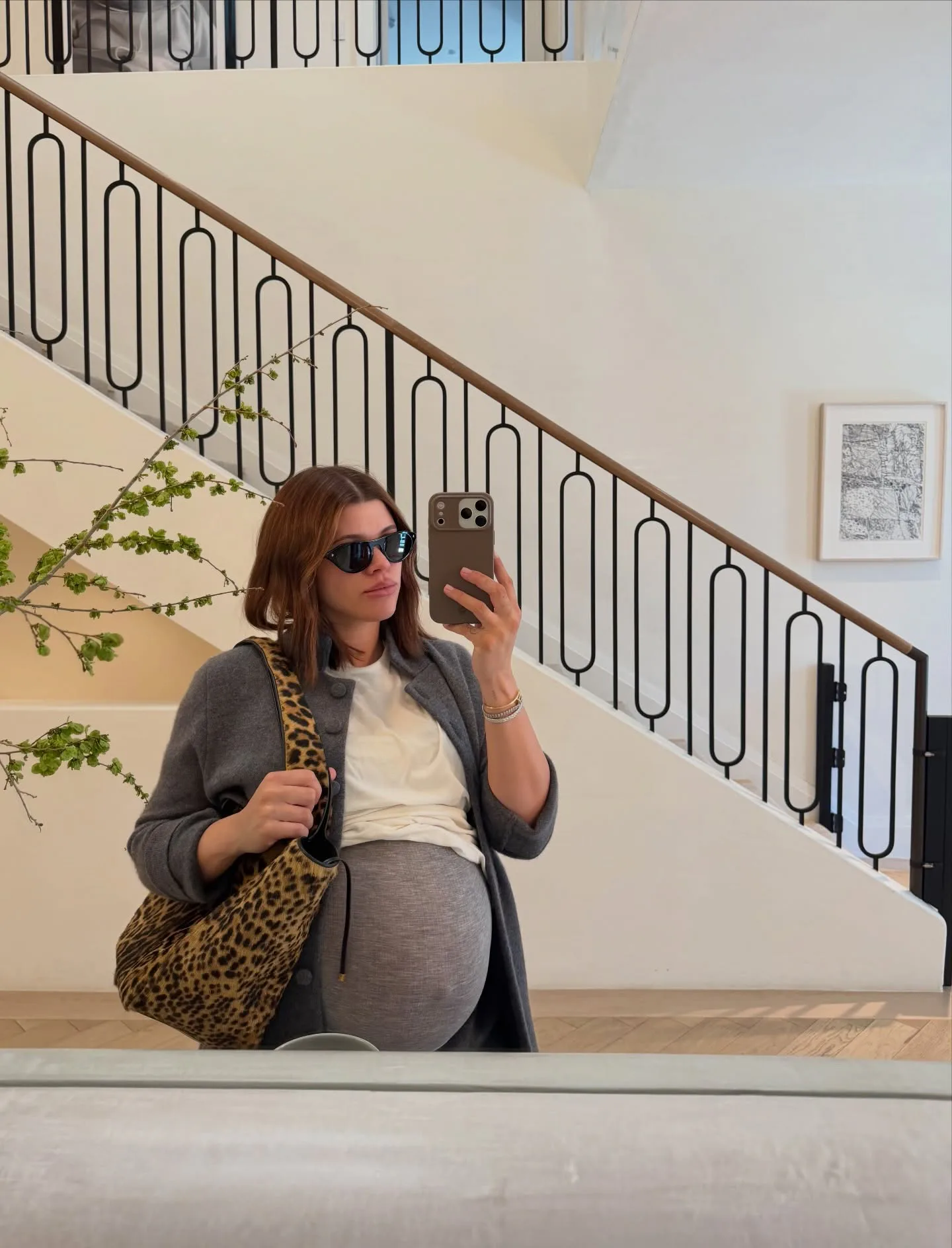 Sofia Richie Grainge in a mirror selfie with caramelized brunette hair 