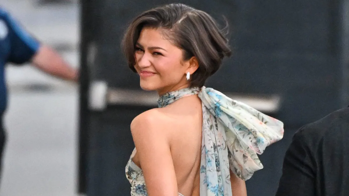 zendaya shorts under dress Zendaya shows off her new wavy weave as she steps out in multi-coloured dress in New York