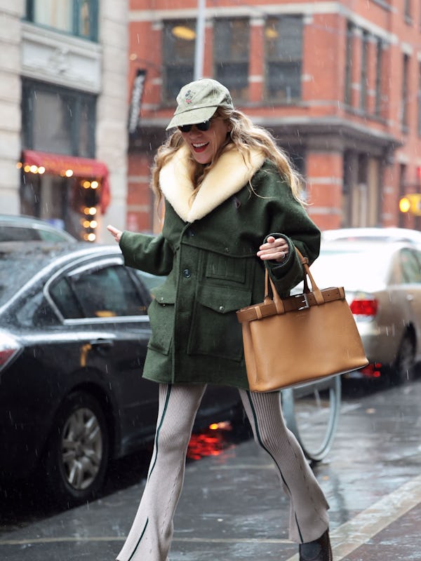 Chloë Sevigny carrying a Prada Buckle bag.