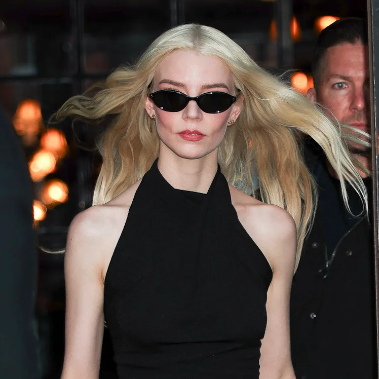 Anya Taylor-Joy wearing a leopard print skirt.