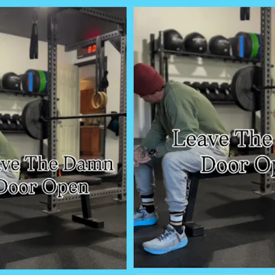 A screenshot of an Instagram reel featuring a man on a workout bench with a child interrupting. The text overlay reads, "Leave The Damn Door Open"