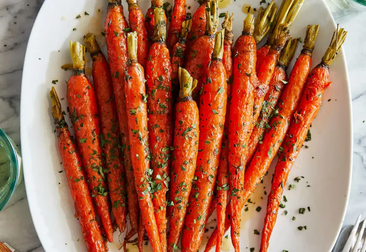Glazed carrots on a serving platter in a story about easy easter recipes