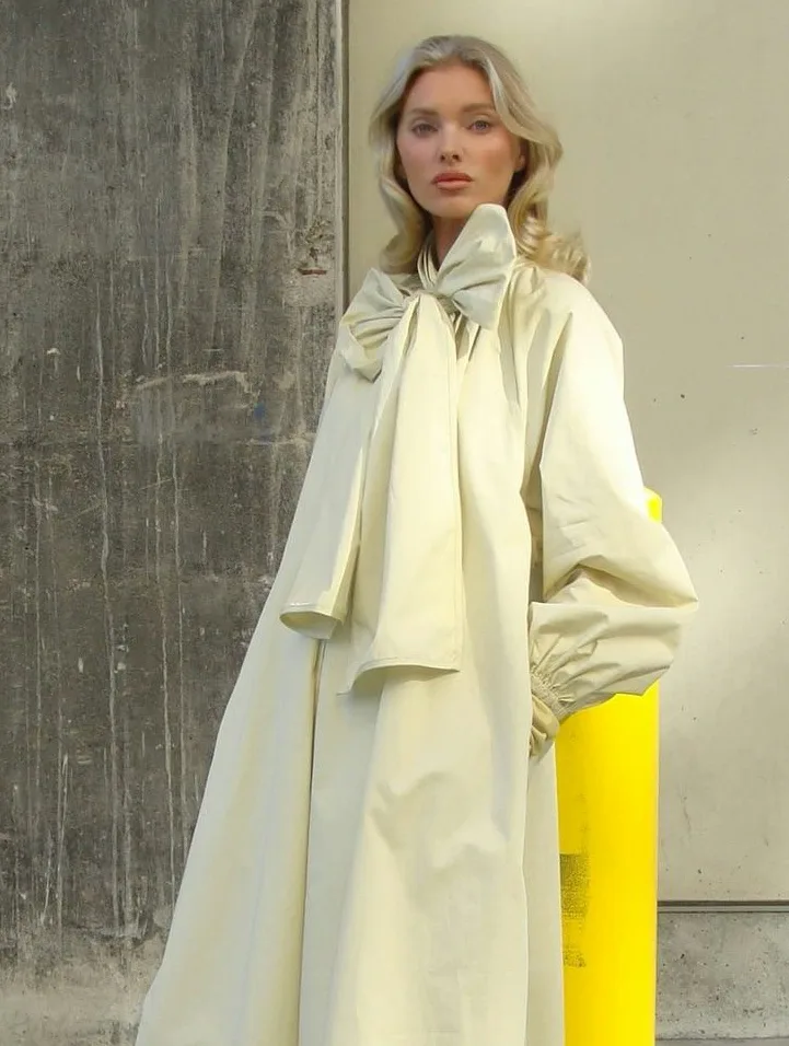 Elsa Hosk wearing butter yellow and red.