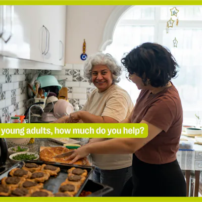 A mom and her adult daughter cooking in the kitchen with text overlay that reads, "Parents of young adults, how much do you help?"