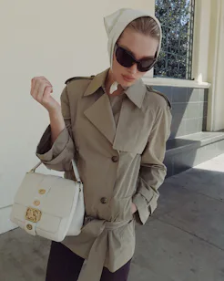 Elsa Hosk wears a Burberry trench coat.