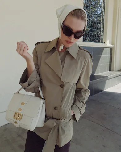 Elsa Hosk wears a Burberry trench coat.