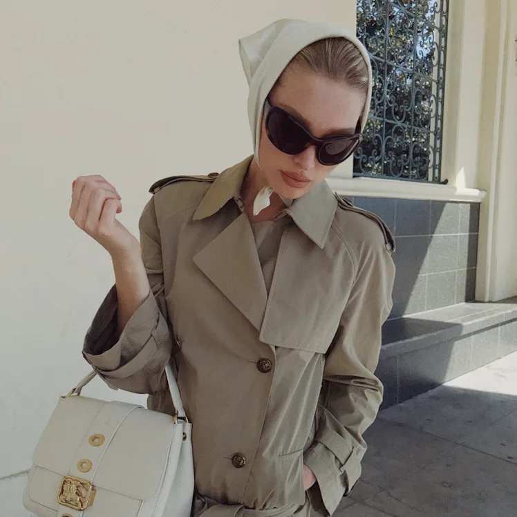 Elsa Hosk wears a Burberry trench coat.