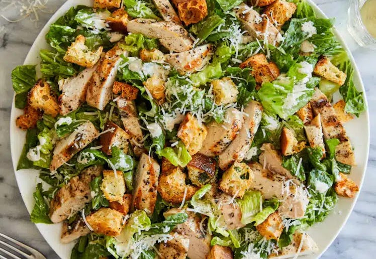 https://damndelicious.net/2023/04/21/best-chicken-caesar-salad-with-homemade-croutons/