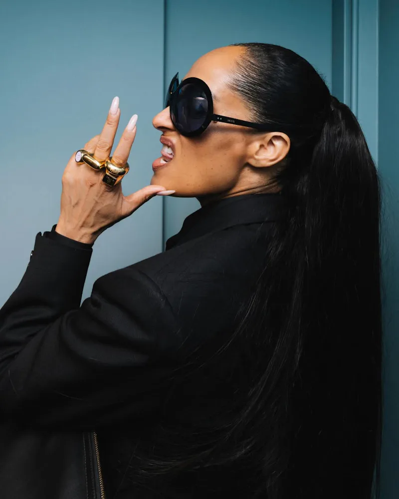 Tracee Ellis Ross with pigtails and a milky manicure