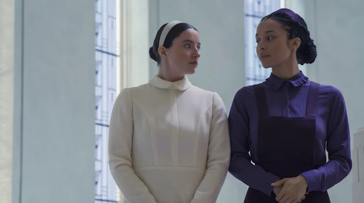 Lucy Halliday and Chase Infiniti in The Testaments