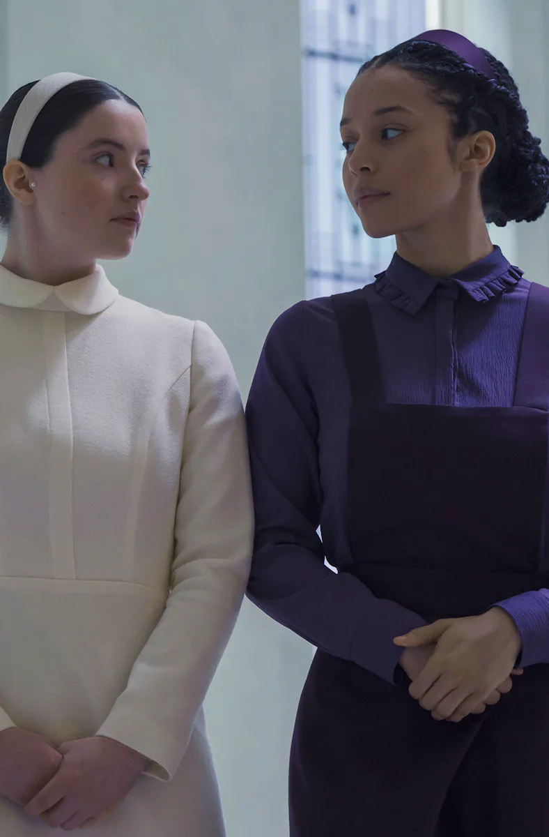 Lucy Halliday and Chase Infiniti in The Testaments