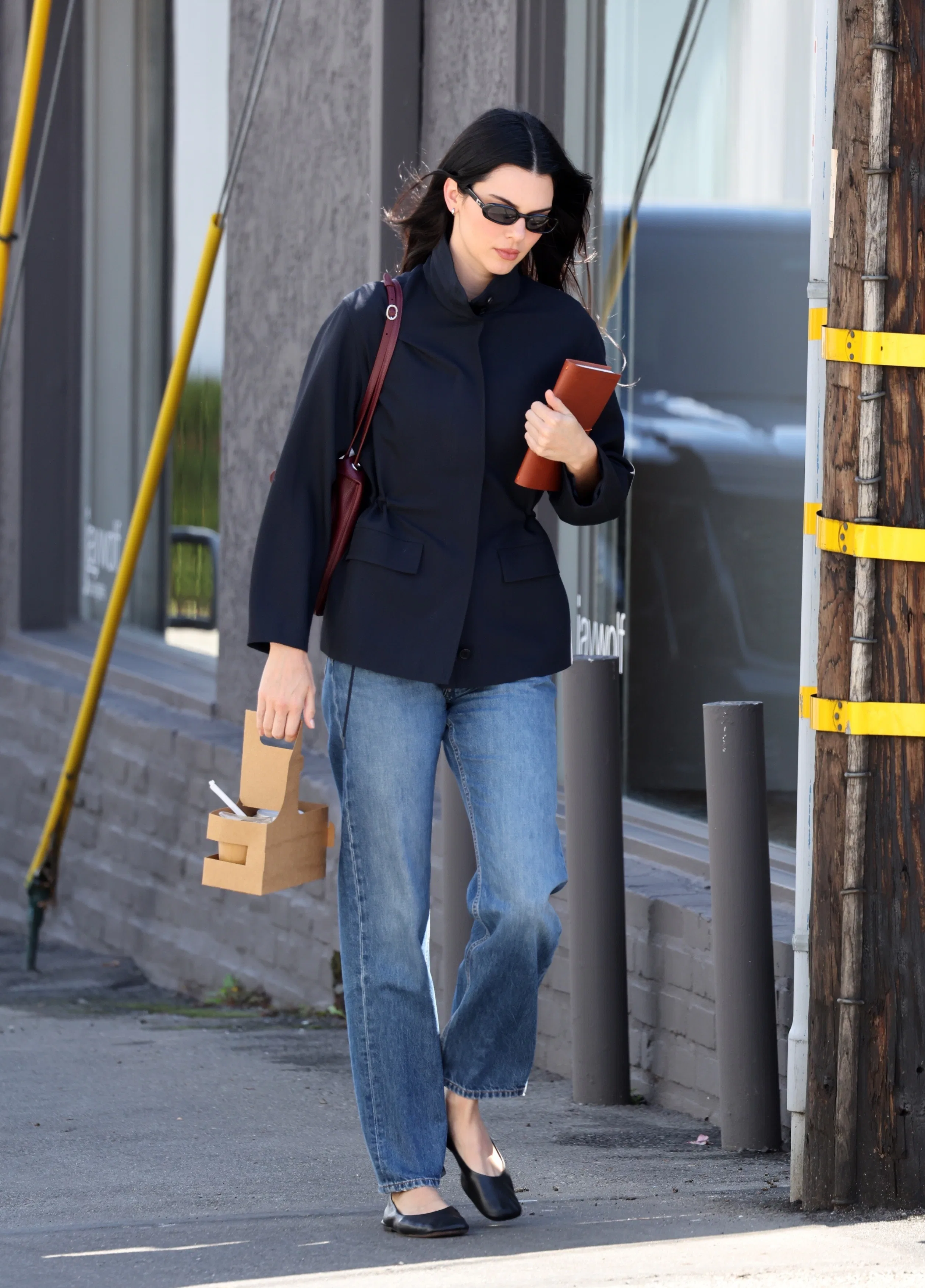 Kendall Jenner’s Business Look Includes Blue Jeans & New-and-Improved It Bag