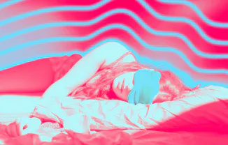 A woman laying down, testing TikTok's "sleepmaxxing" trend.