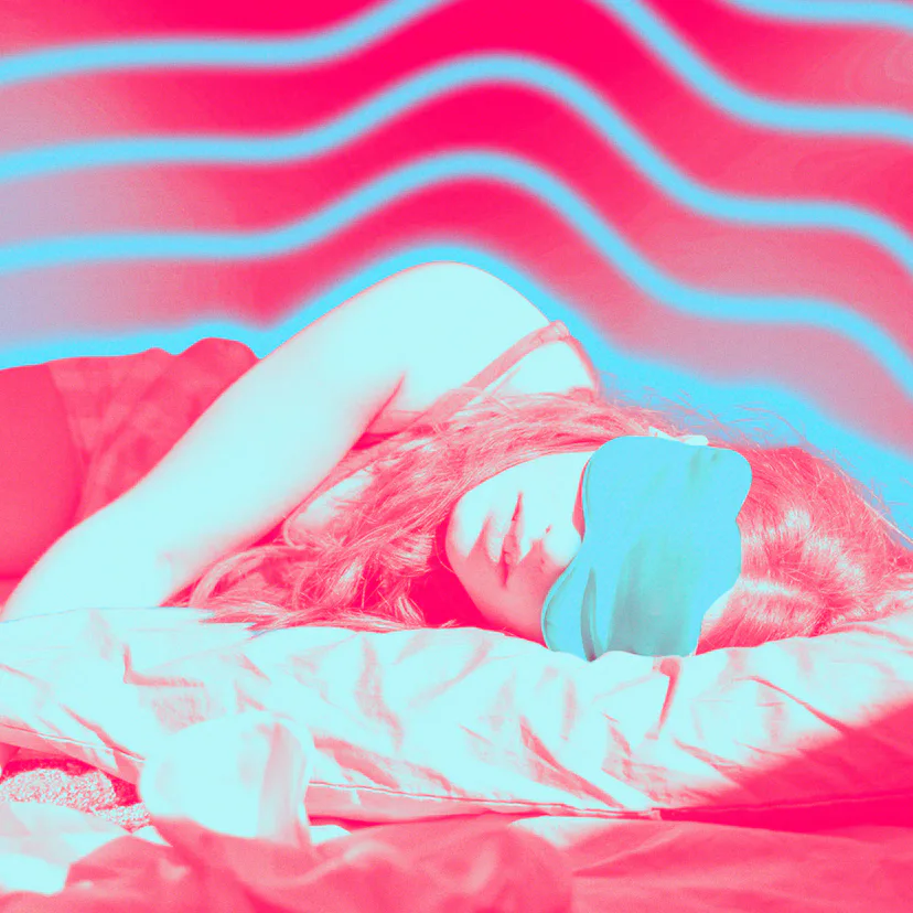 A woman laying down, testing TikTok's "sleepmaxxing" trend.