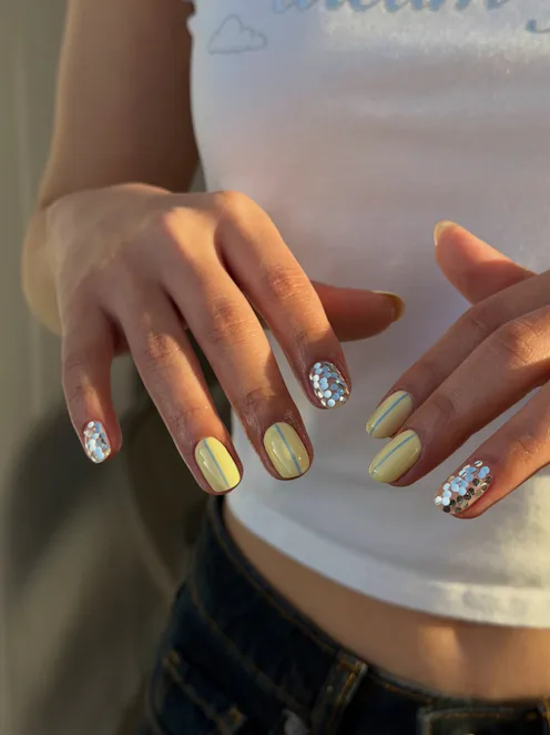 Sequin nails will dazzle all season long.
