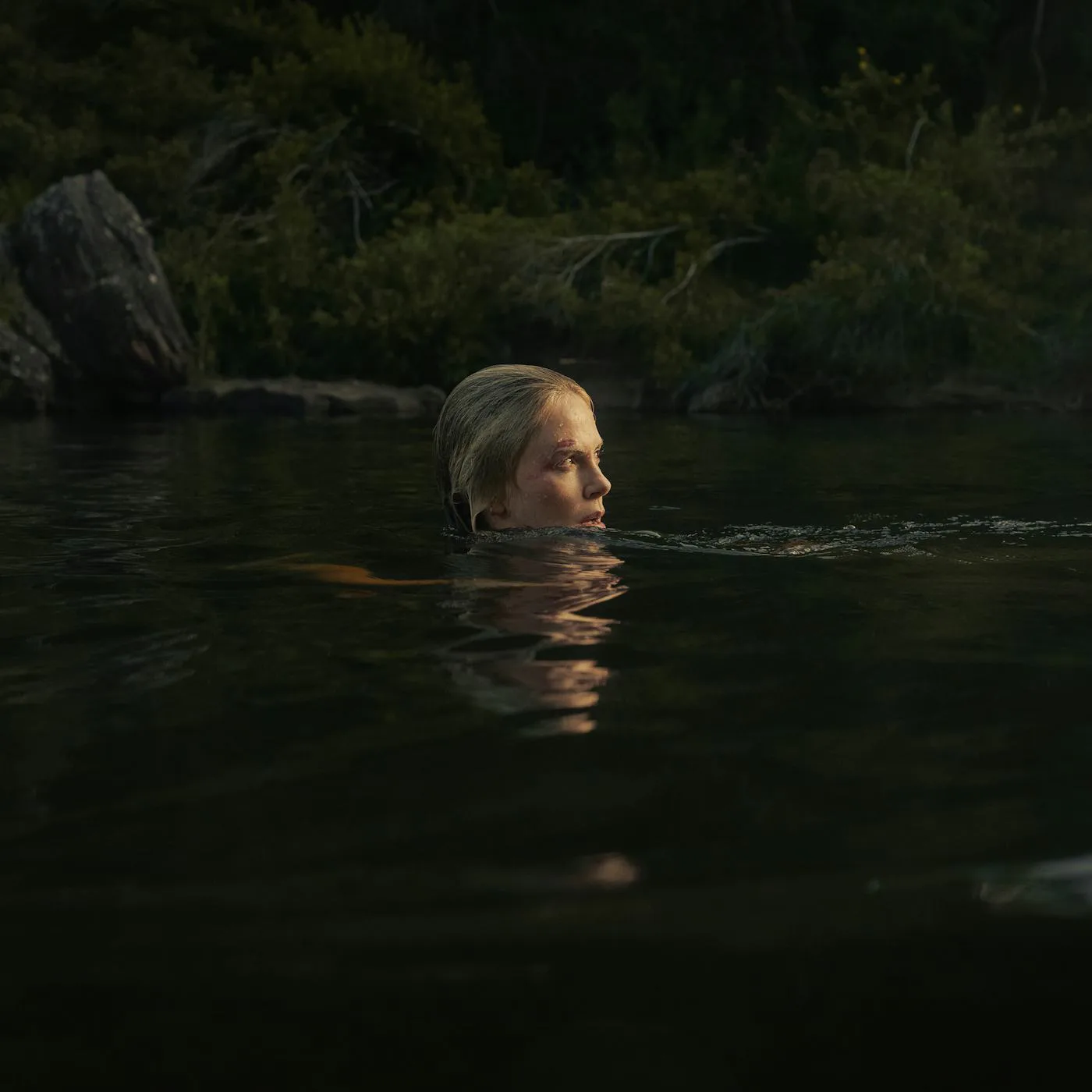 'Apex' Is A Mostly-OK Action Flick Elevated By Charlize Theron