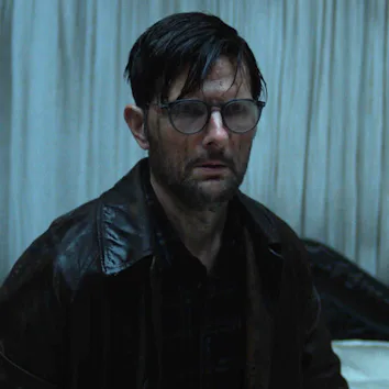 Adam Scott as Ohm Bauman in Hokum