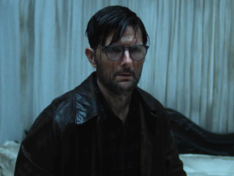 Adam Scott as Ohm Bauman in Hokum