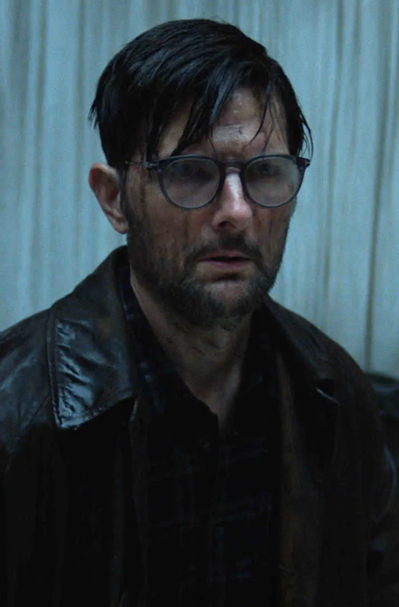 Adam Scott as Ohm Bauman in Hokum