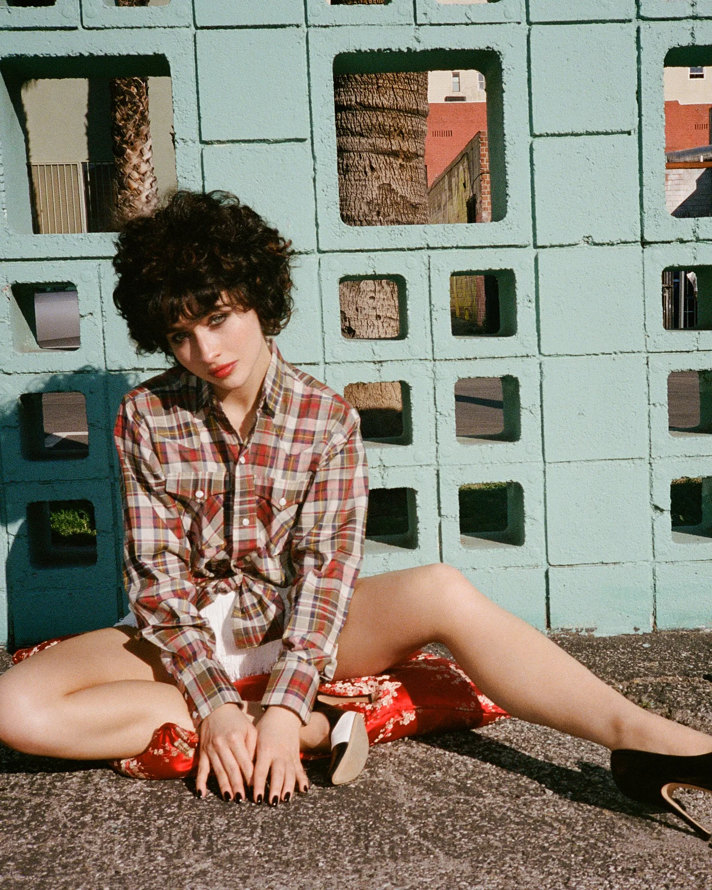 Sabrina Carpenter with black hair on the cover of Perfect magazine