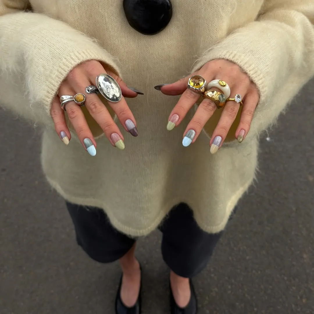 "Pill nails" put a graphic spin on traditional French tip manicures.