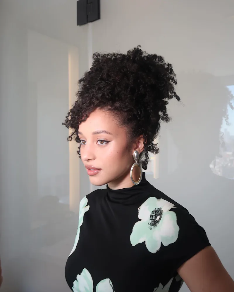 Chase Infiniti with a defined wash and go updo