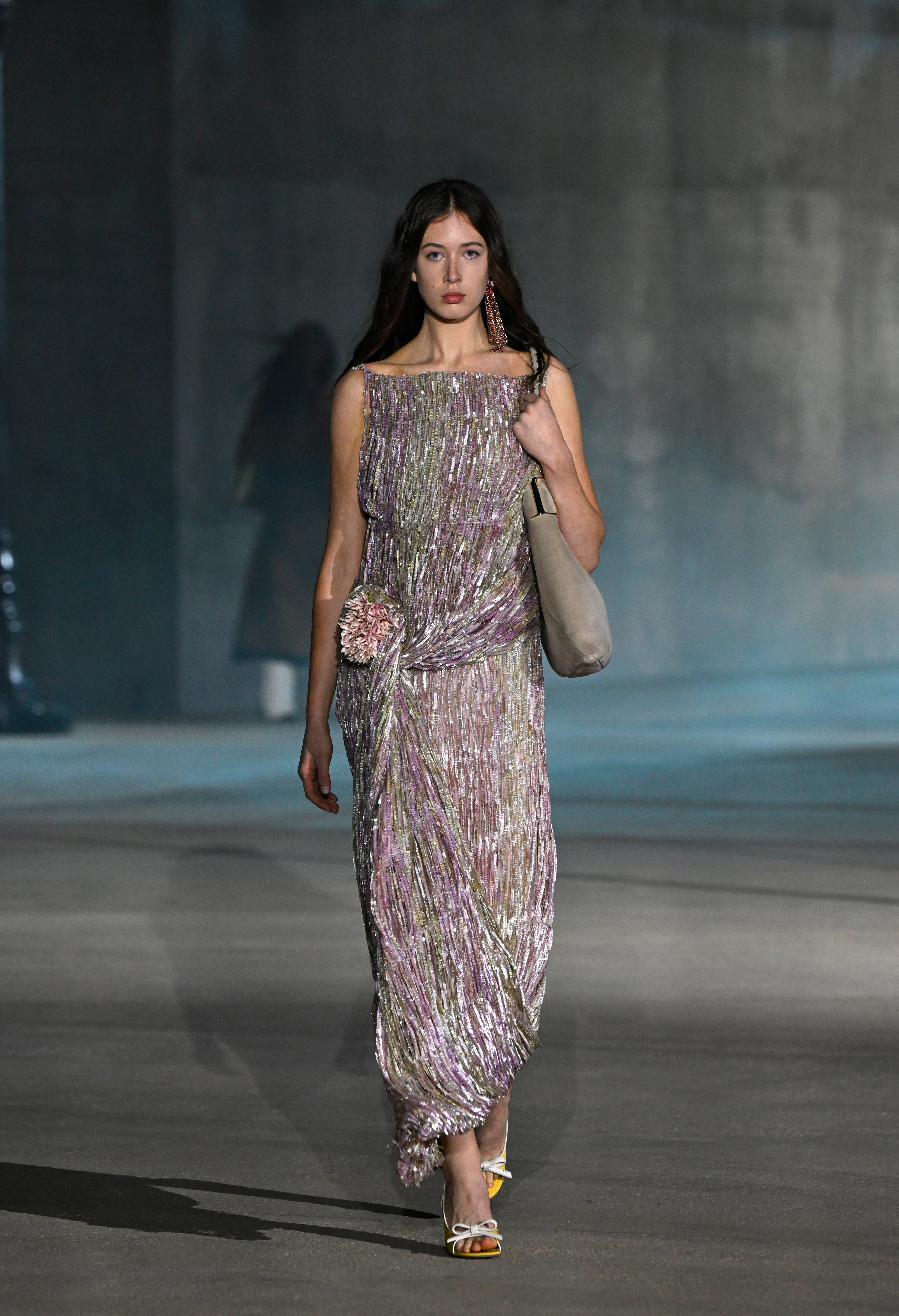 A model walks the runway at the Dior 2027 Cruise Collection Show held at LACMA on May 13, 2026 in Lo...