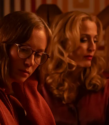 Hannah Einbinder and Gillian Anderson in Teenage Sex and Death at Camp Miasma
