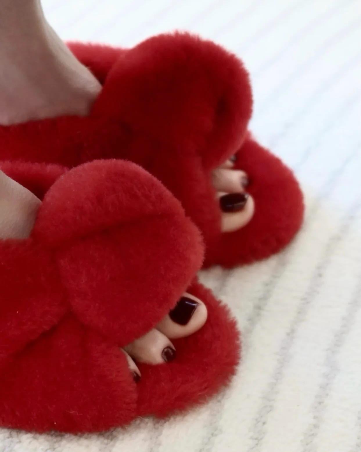 Iram Shelton with a burgundy pedicure
